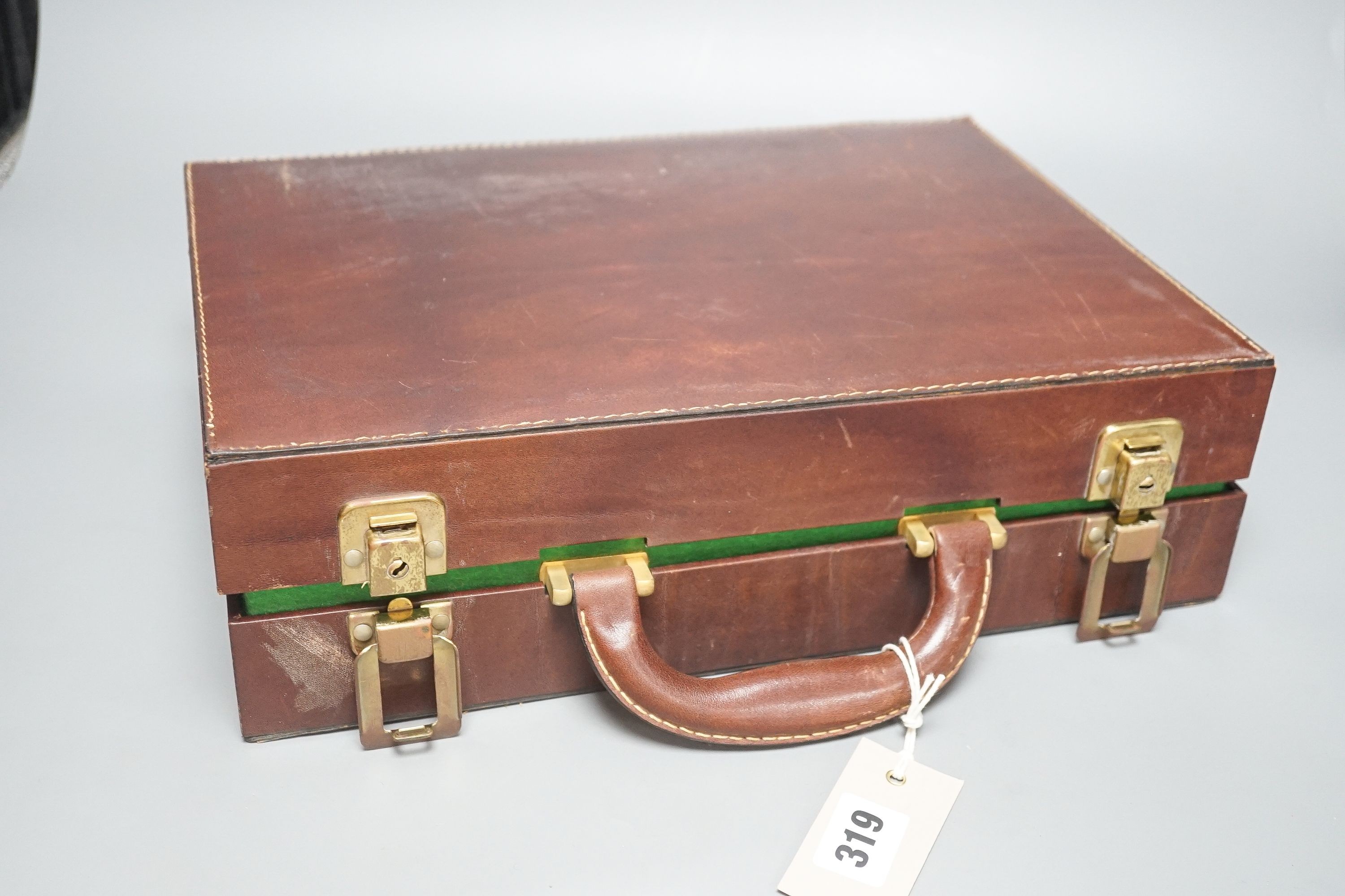 An Asprey tan leather cased games box